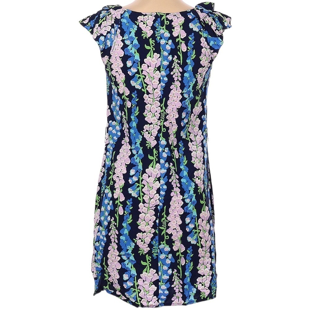 Lilly Pulitzer blue, green, and black floral dress.